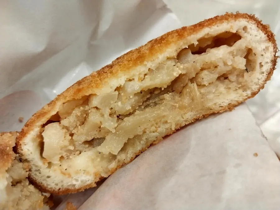 Cross-section of the pollock roe cream croquette showing the cream filling