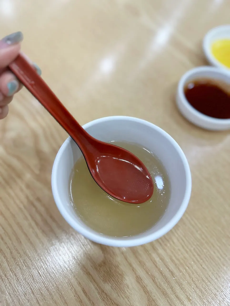 Rich galbitang broth served alongside the milmyeon
