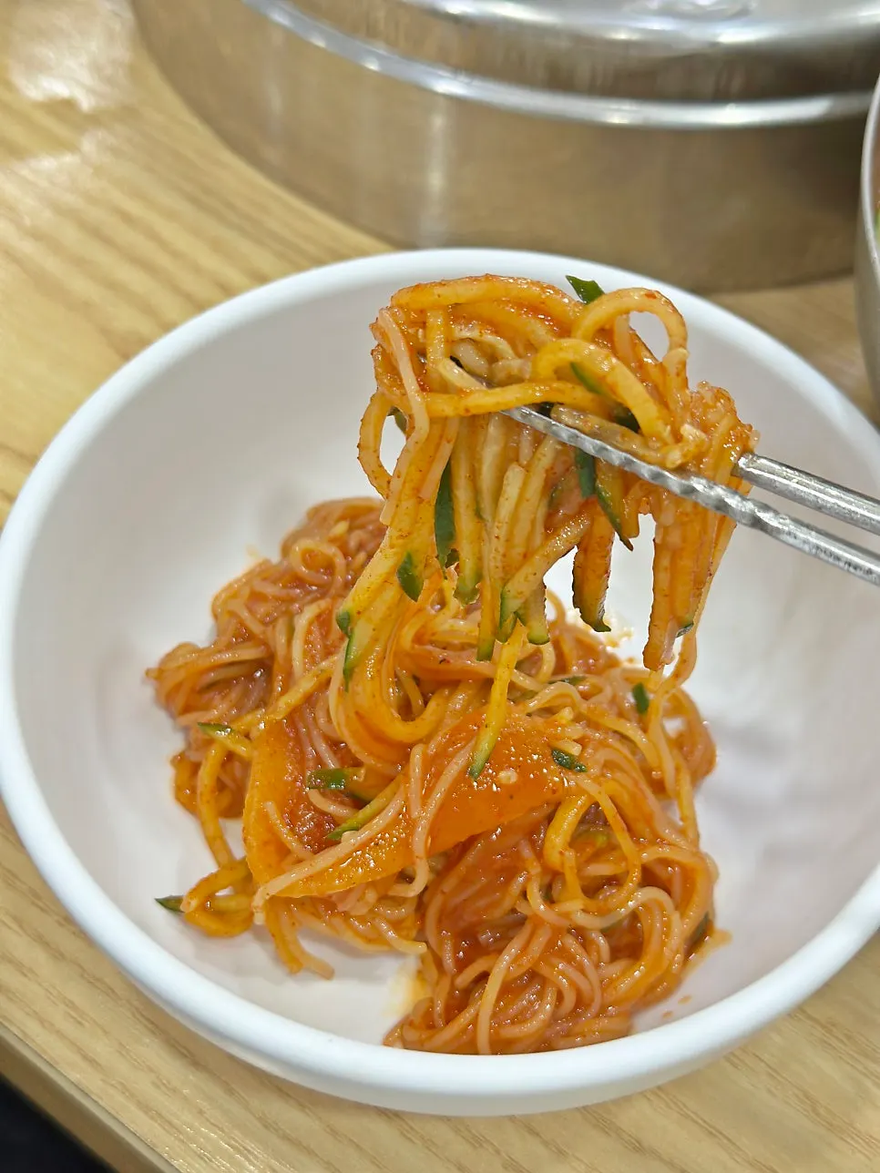 Close-up of bibim-milmyeon with shredded cucumber