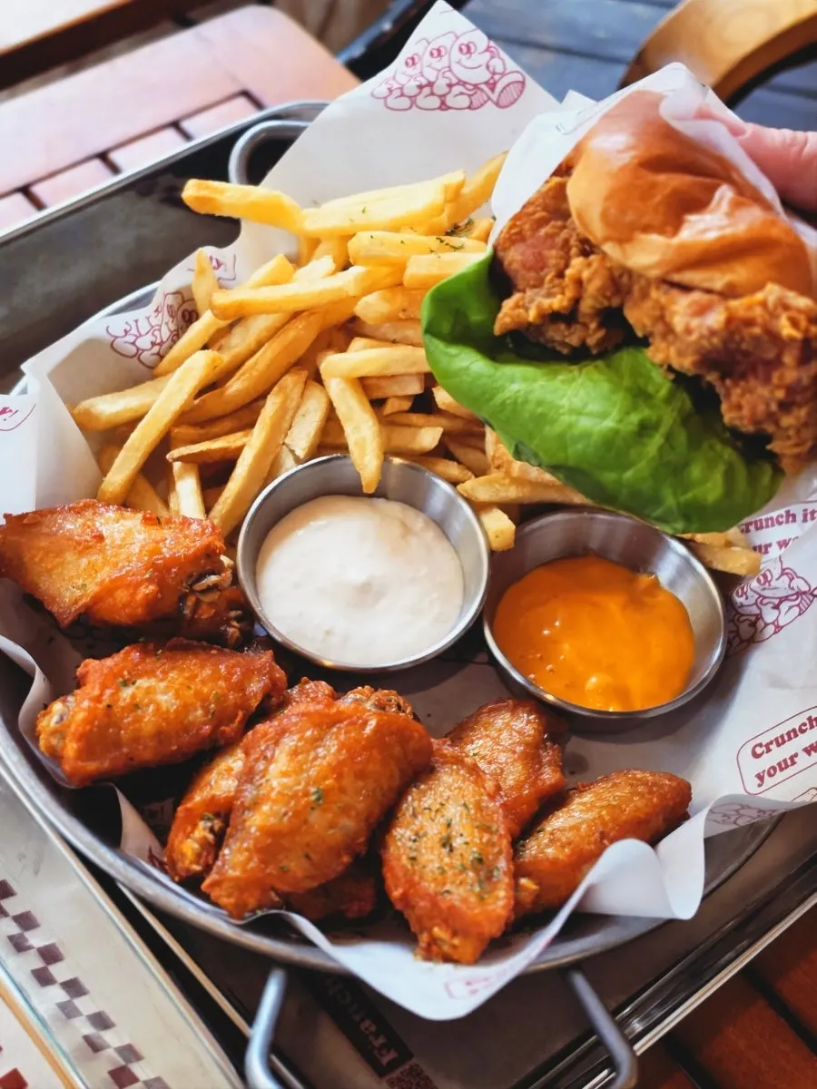 Chicken burger and platter meal spread