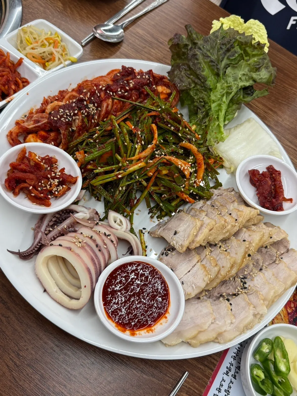 Full spread of the Yangeunine Set with squid bossam and pollack soup
