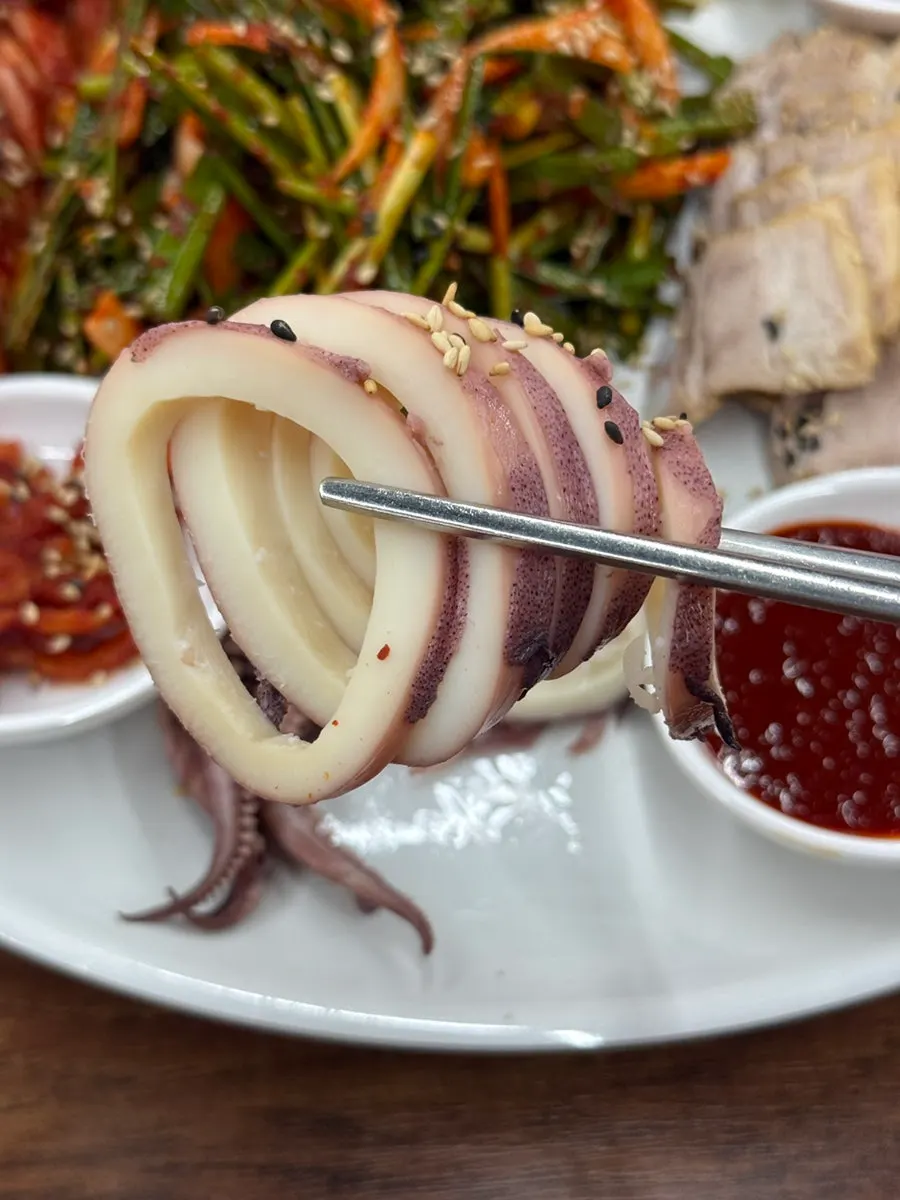 Bossam pork wrapped with bossam kimchi