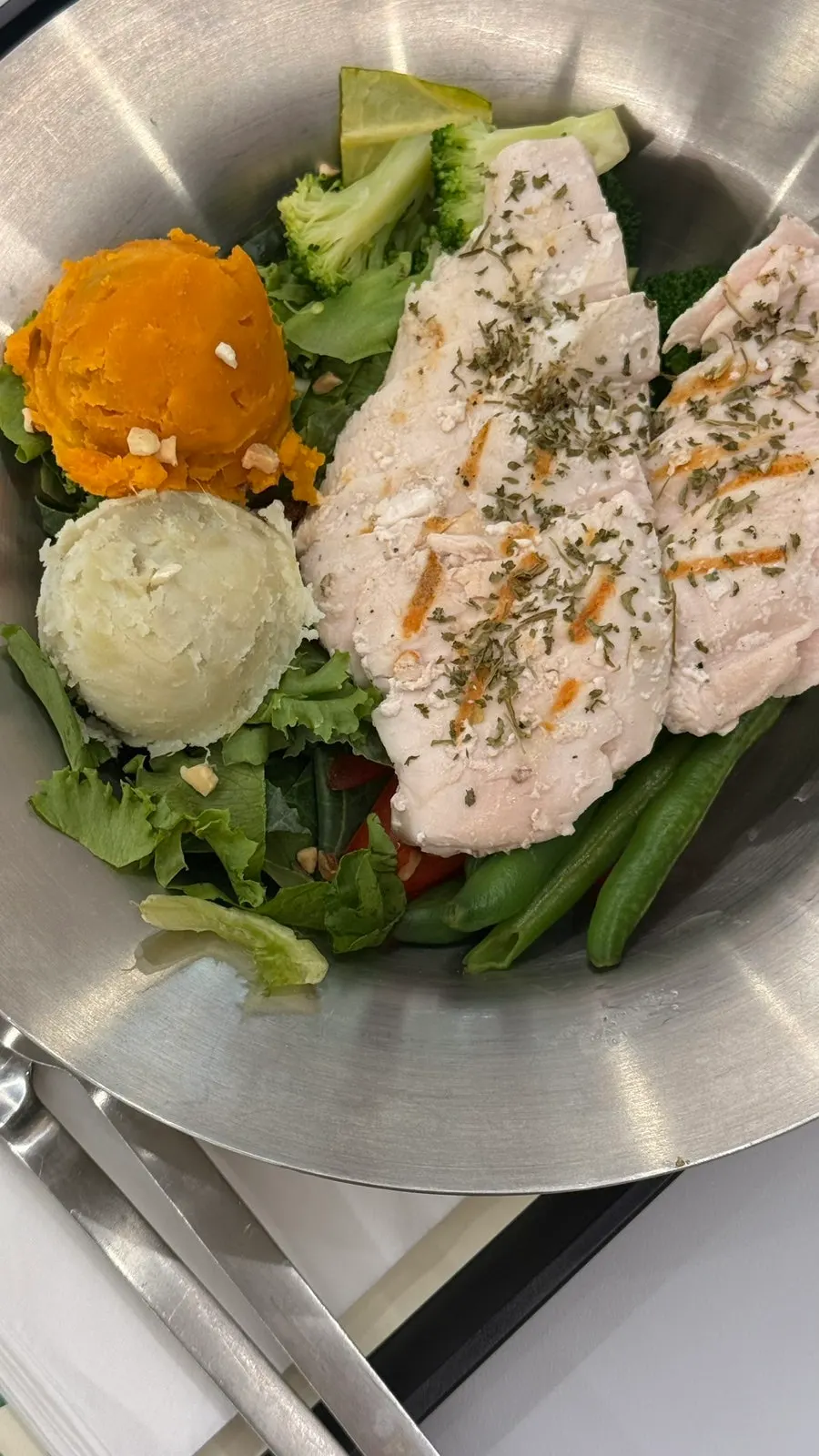 The neatly plated chicken plate salad