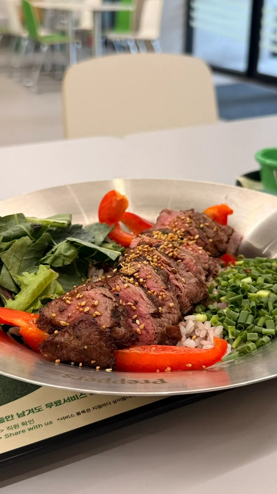 Close-up of beef topped with wasabi sauce
