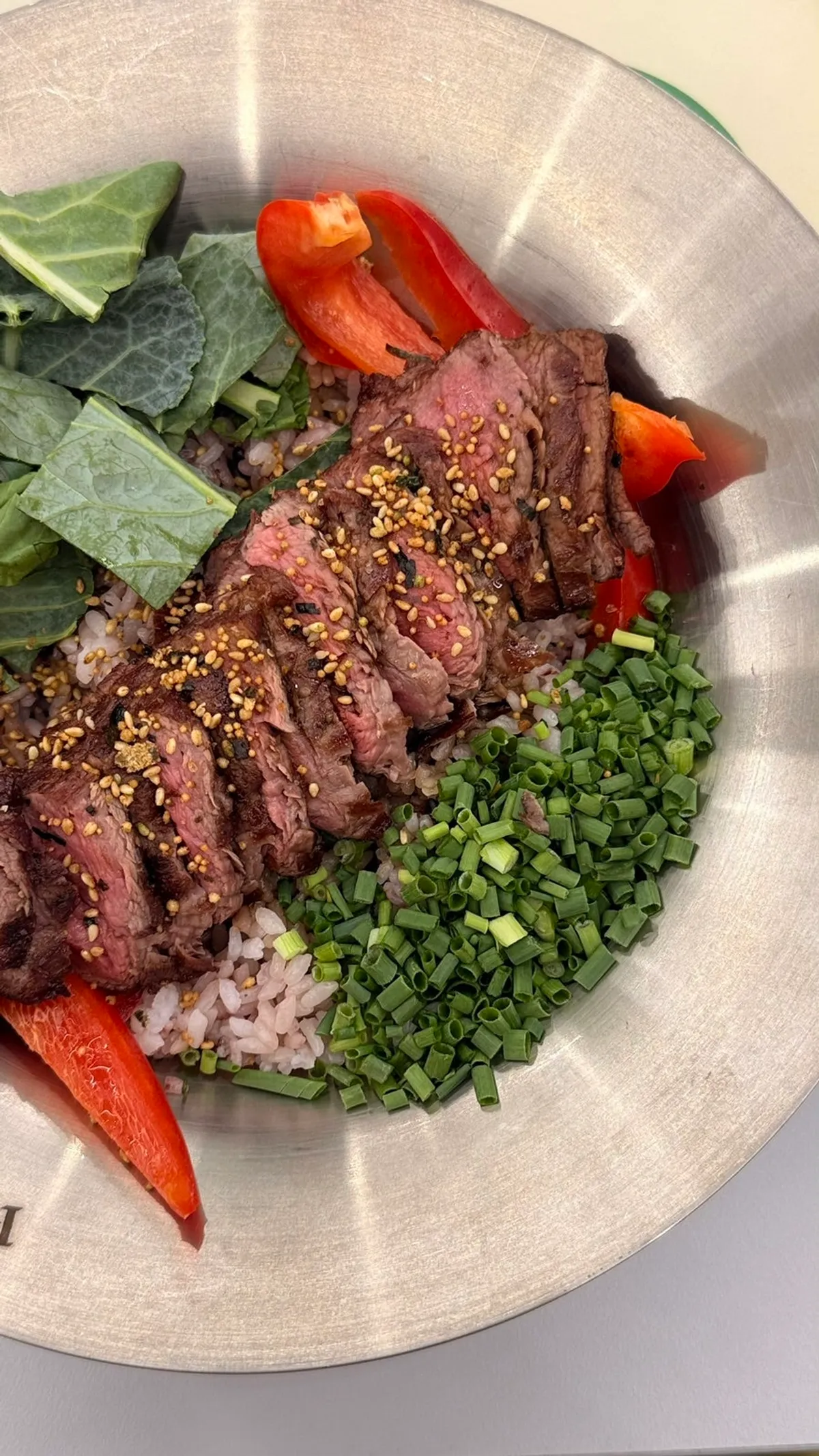 Glossy rice mixed with beef in the bowl