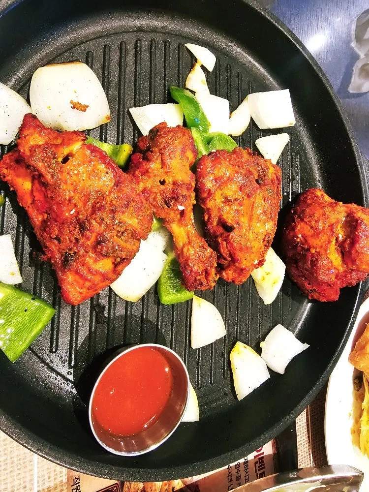 Tandoori chicken half cut into 4 pieces