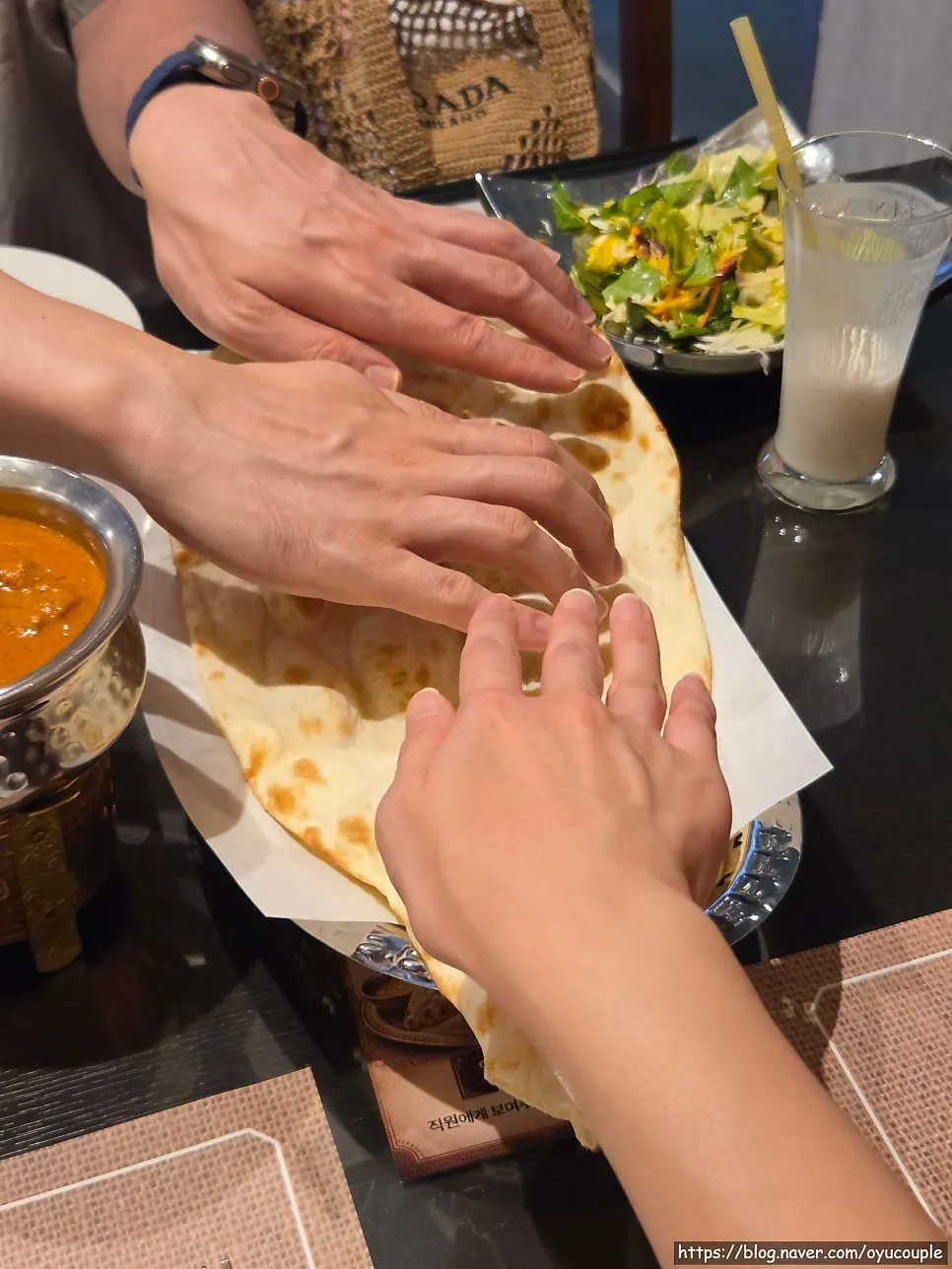 Large naan the size of three palms