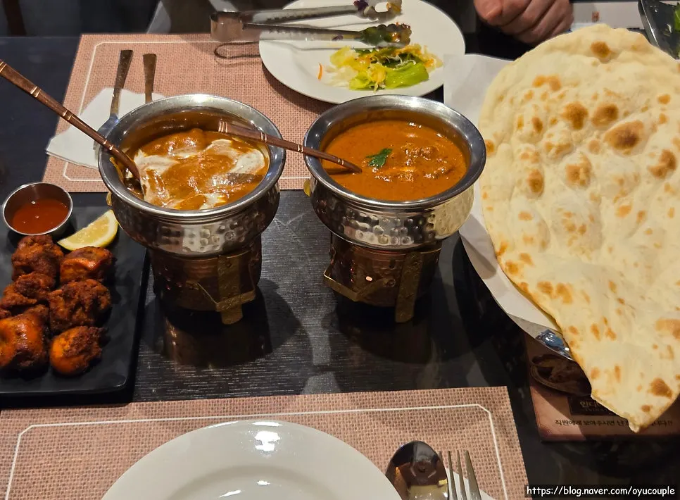 Freshly grilled plain naan and butter naan