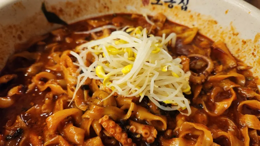 Knife-cut noodles coated in the broth seasoning