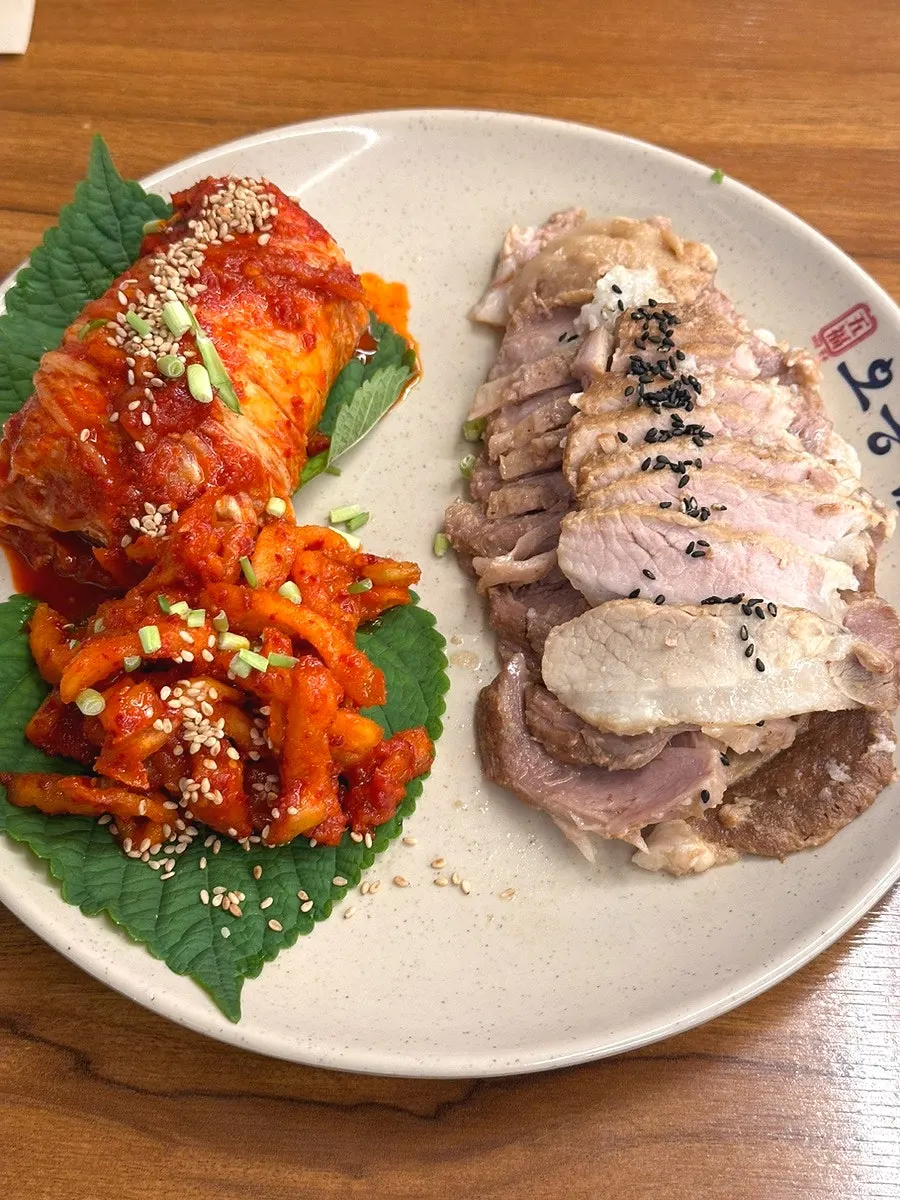 Octopus, bossam, and makguksu meal set