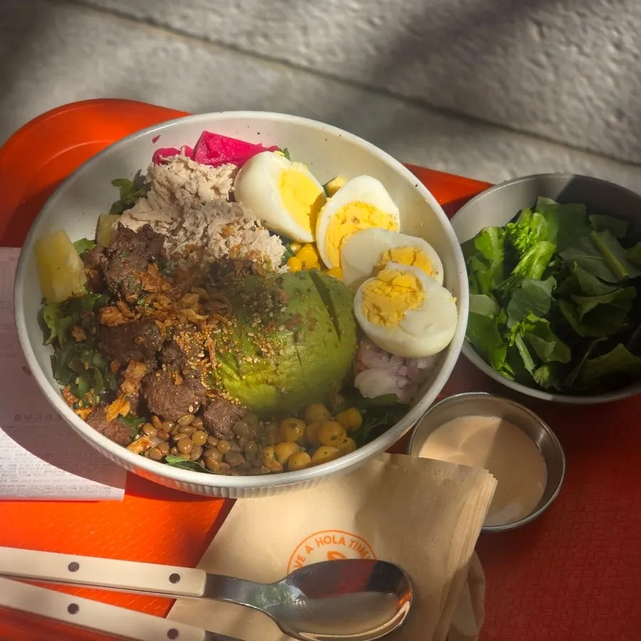 Avocado poke placed on an outdoor terrace table