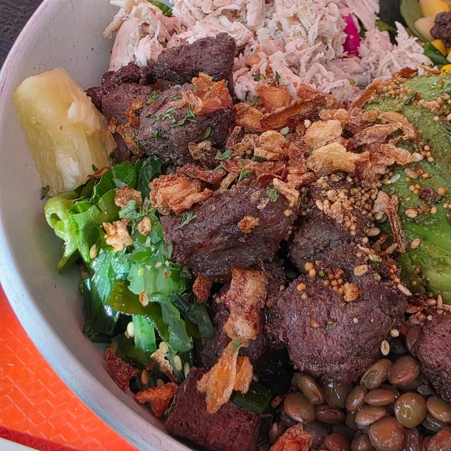 Added steak topping and seaweed on the poke