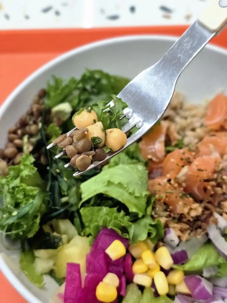Poke topped with a variety of ingredients