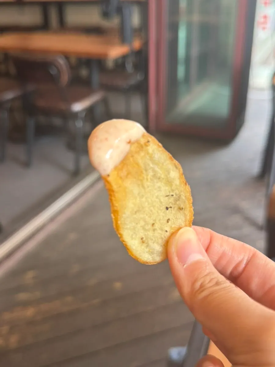 James potato chips enjoyed with sauces