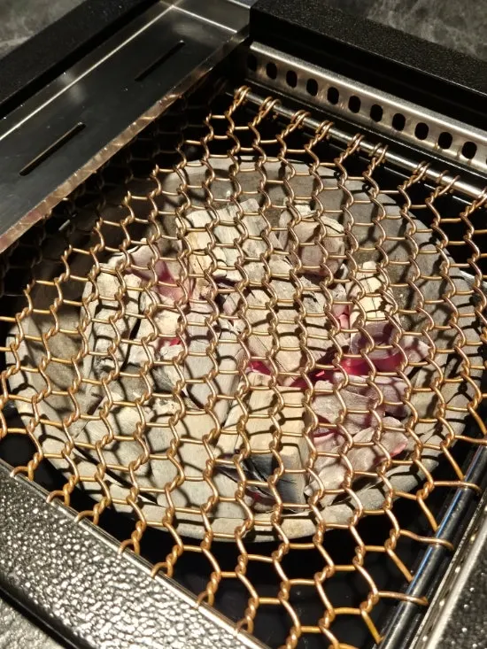 Charcoal grill set up on the table