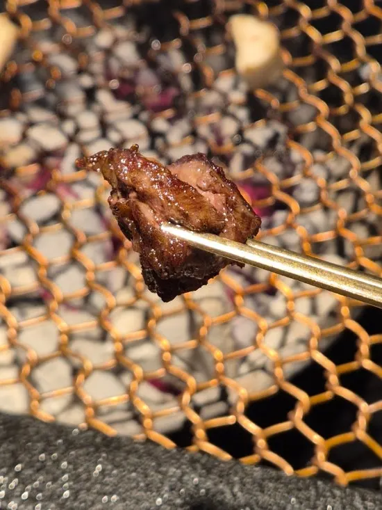 Evenly marbled teuk-deungsim sirloin grilling