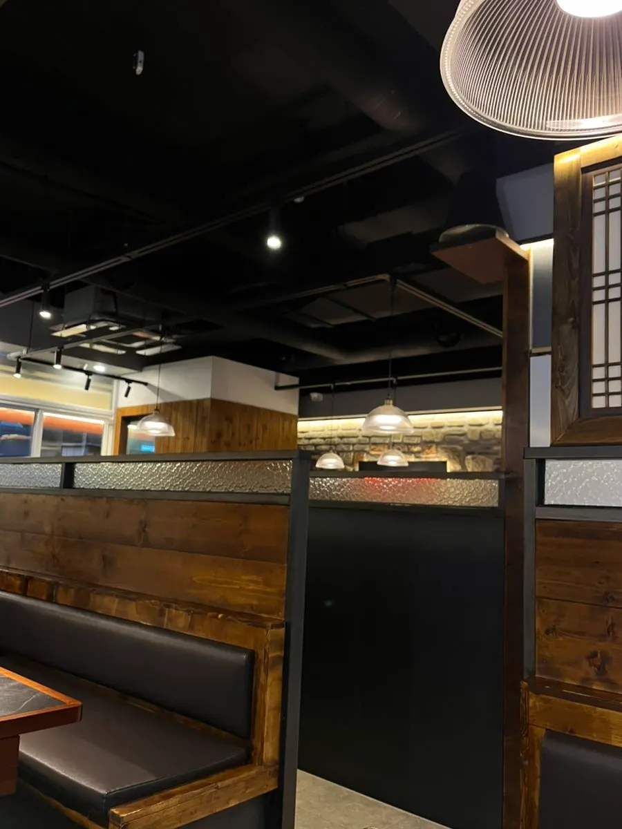 Interior of the BBQ restaurant with divided tables