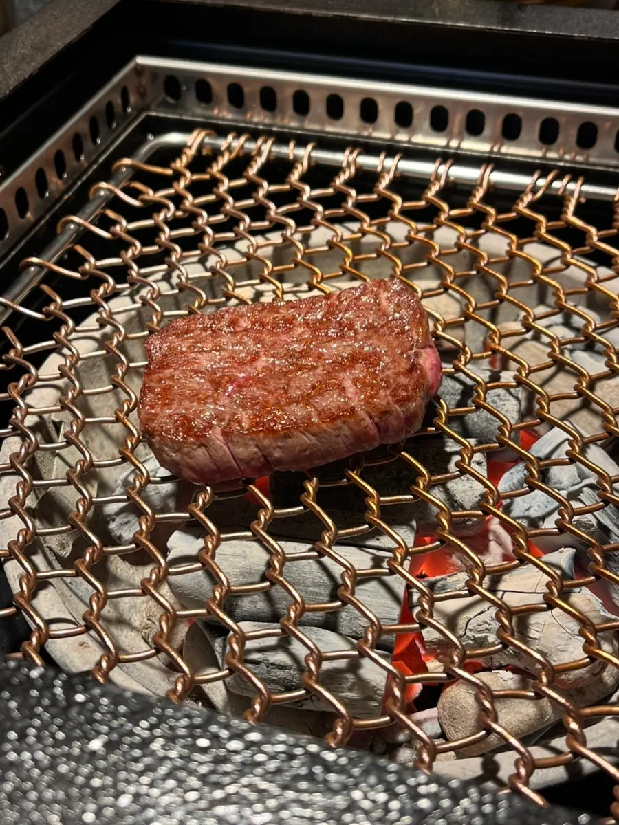 Seolhwa sirloin grilling over charcoal