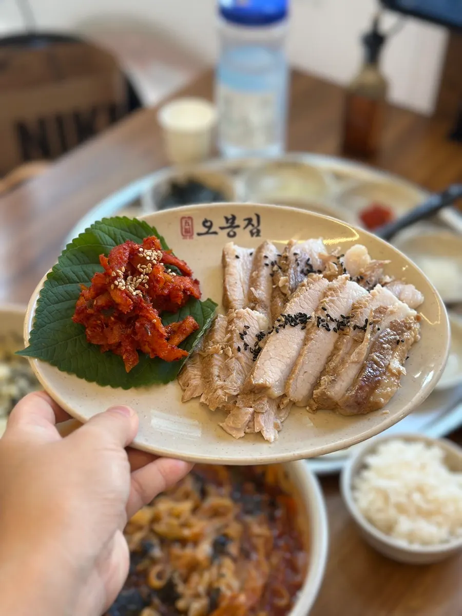 Bossam set served with radish kimchi