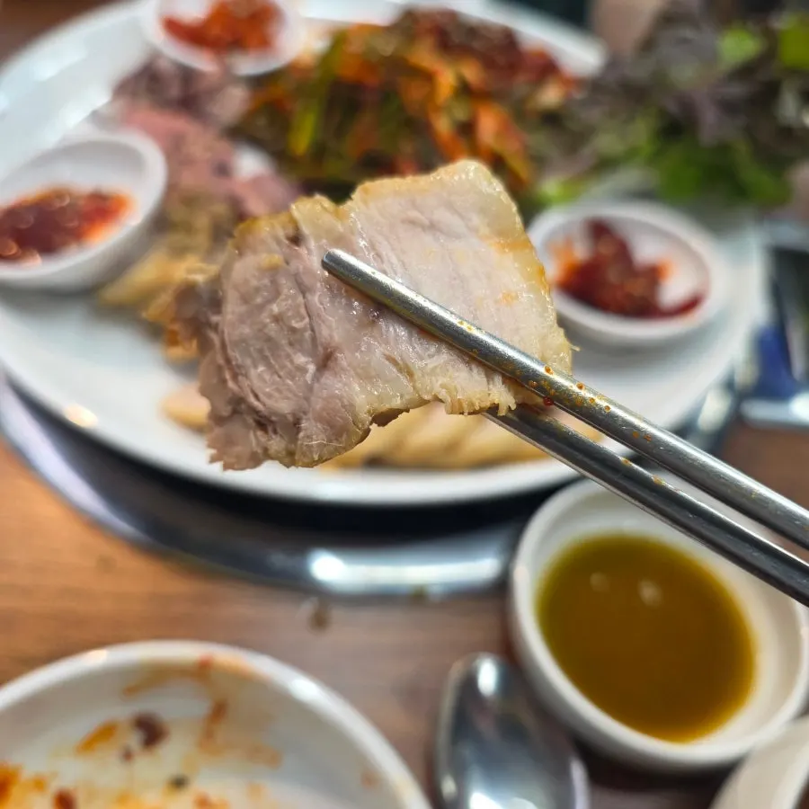 A three-way combination bite of squid bossam