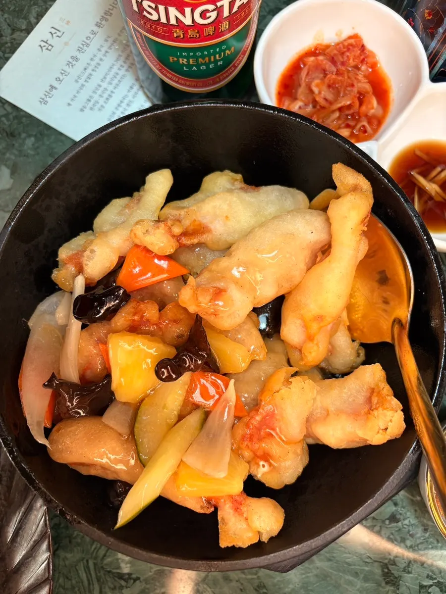 Plate of Tokyo tangsuyuk with pineapple and wood ear mushroom