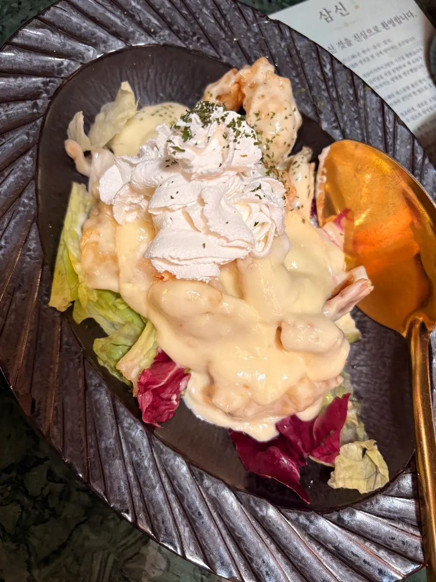 Fried cream shrimp served over lettuce and radicchio