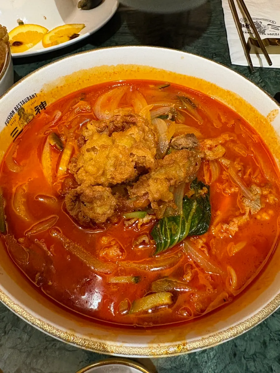 Tebanaka meat jjamppong topped with fried chicken