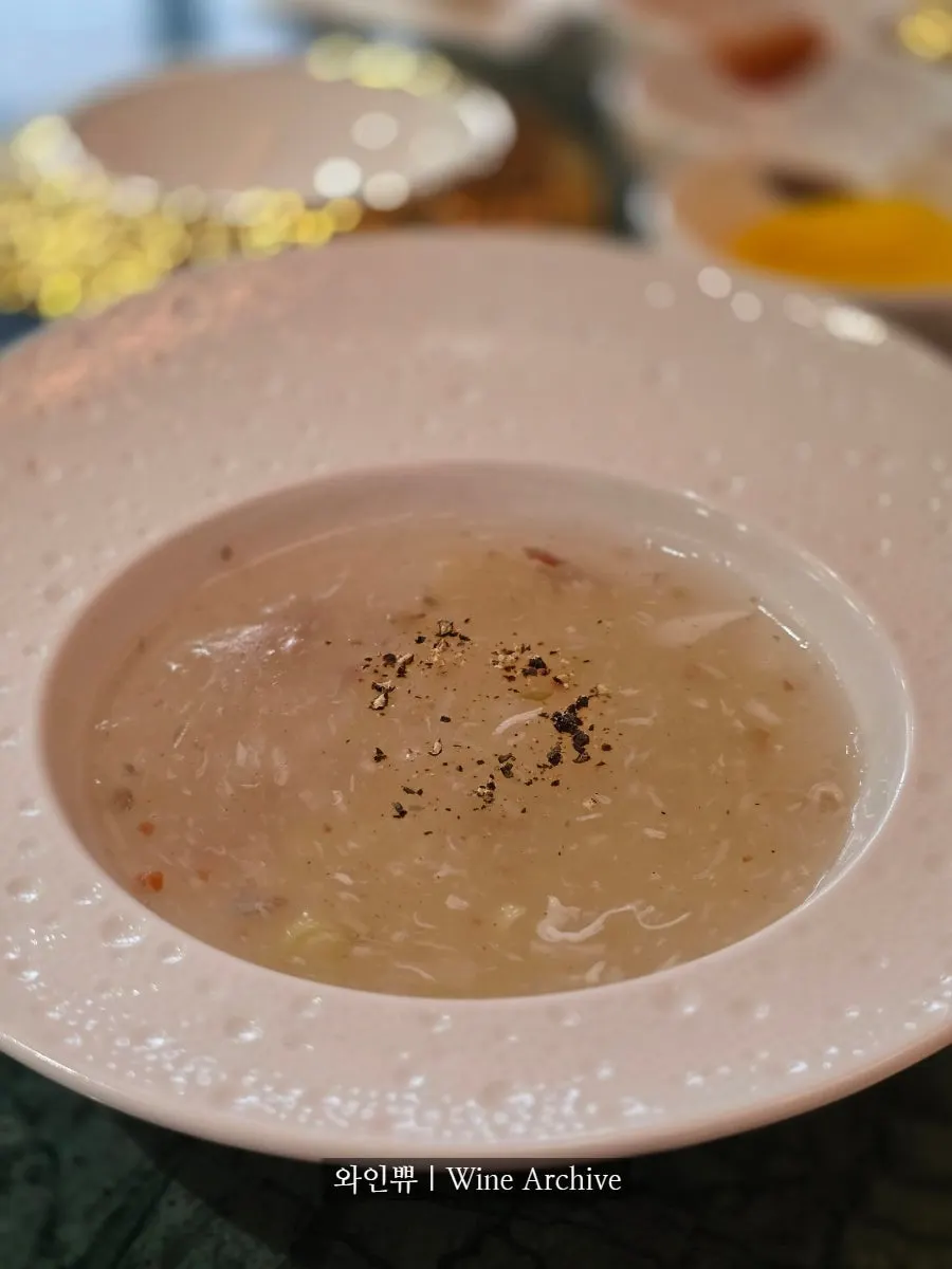 Close-up of the crab soup in its bowl