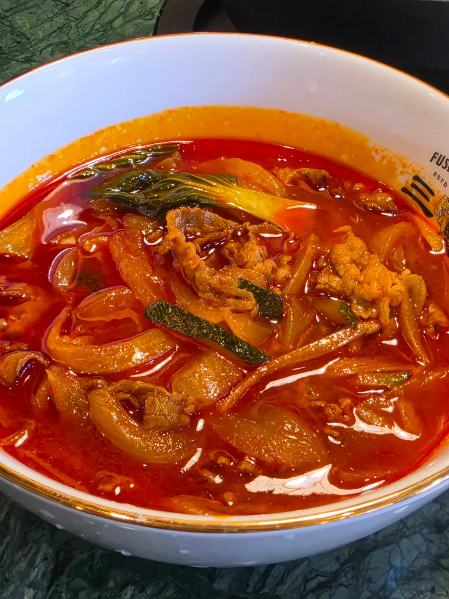 Taean potato jajangmyeon with sauce served on the side