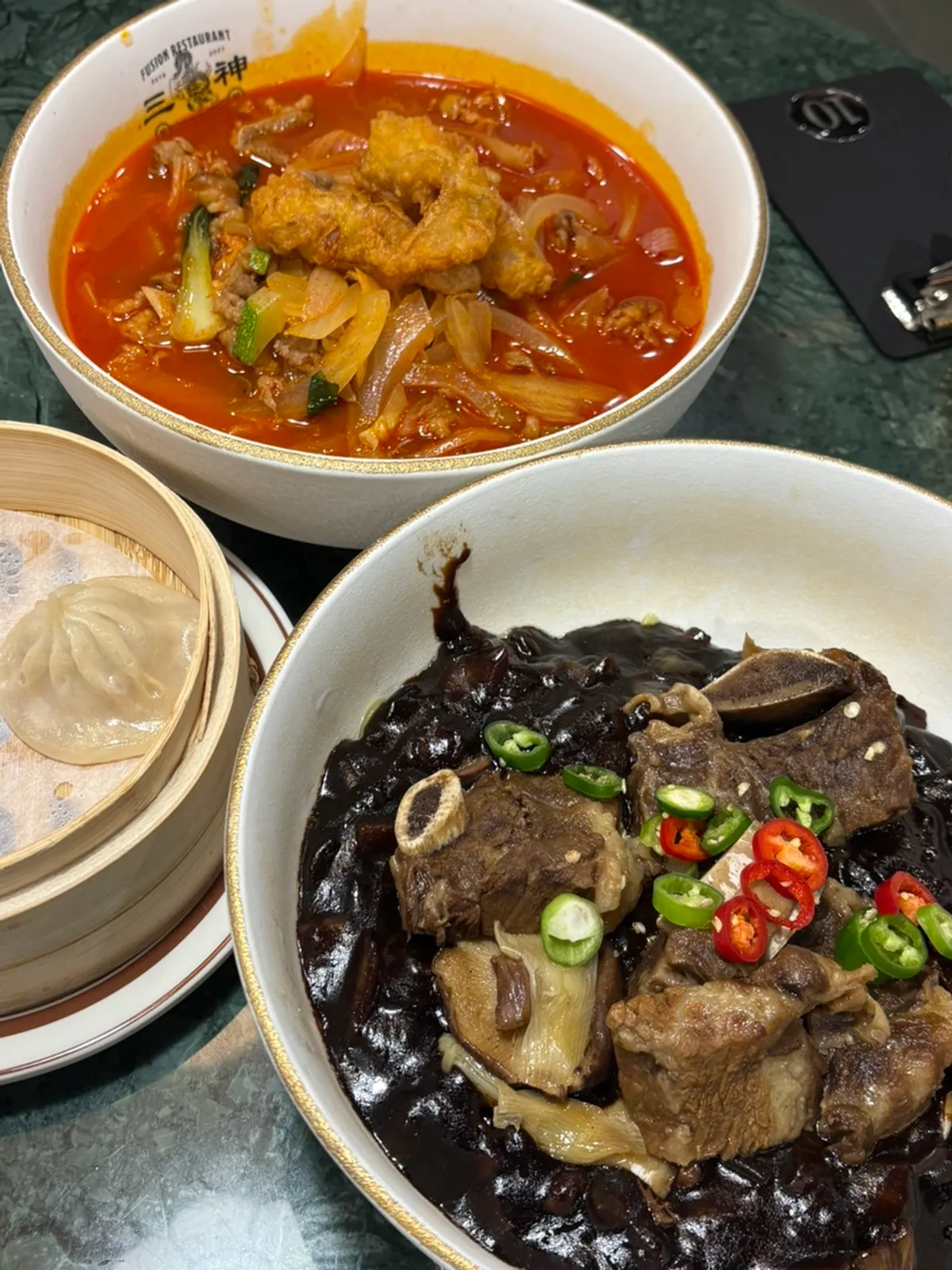Galbi-jjim jajangmyeon and Tebanaka jjamppong served together