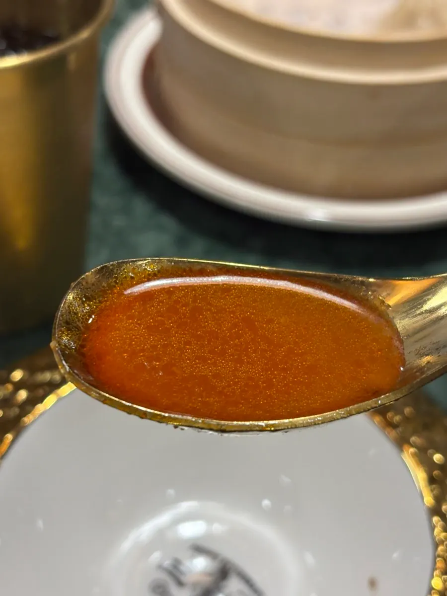 Close-up of the jjamppong broth and fried chicken