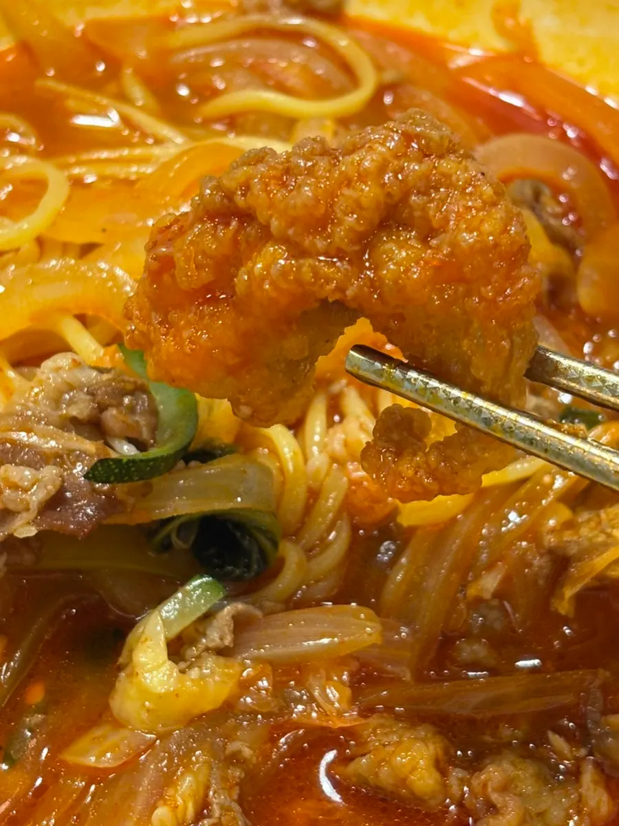 Bok choy and onion mixed into the jjamppong