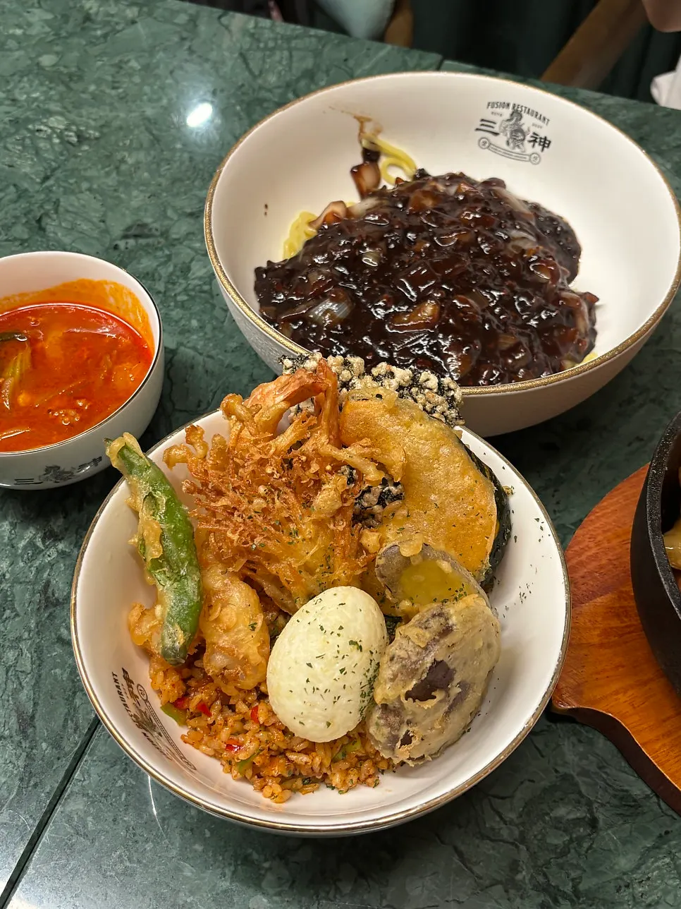 Mini jjamppong broth served alongside the tendon kimchi fried rice