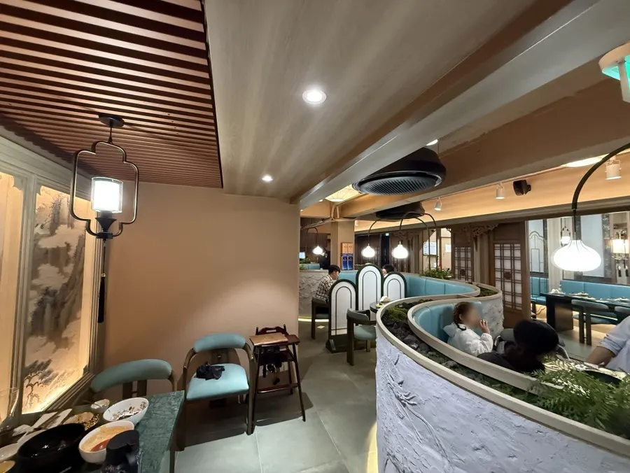 Samsin's 2nd floor interior with dragon decorations and a blue-wood combination