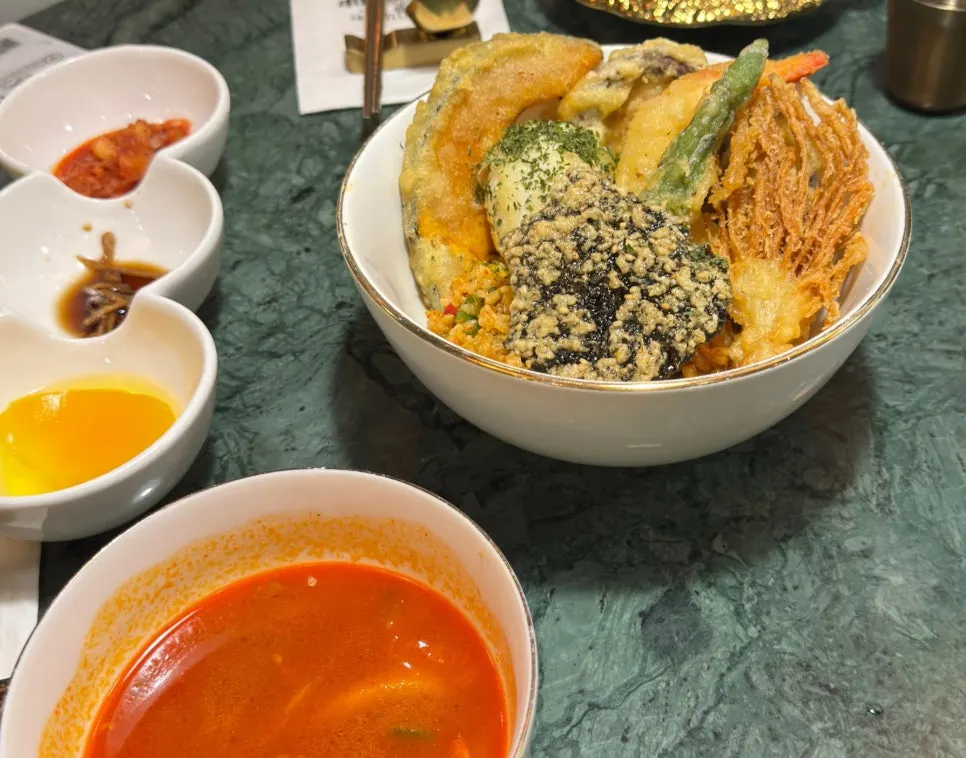 Wide shot of the tendon kimchi fried rice table setting