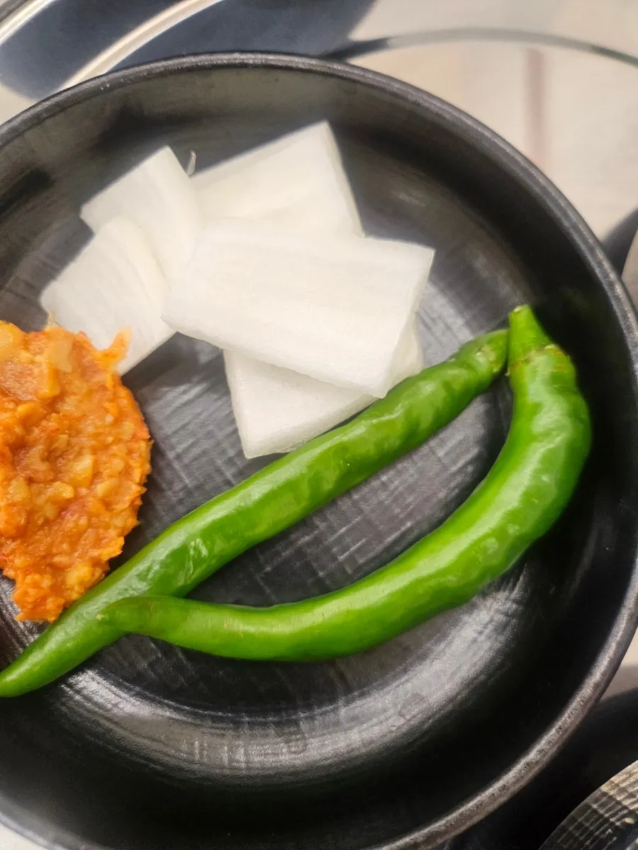 Self-serve bar with pickled onion, peppers, and ssamjang