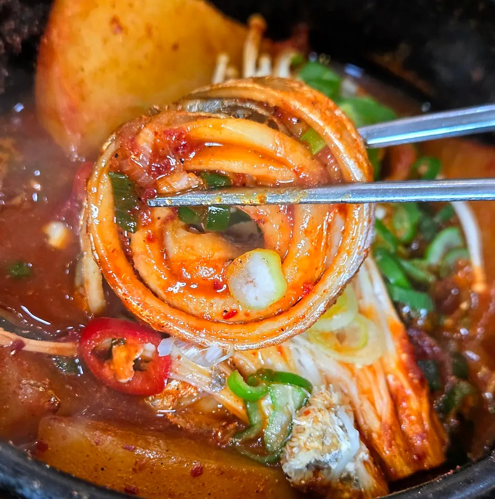 A bite of boneless cutlassfish stew served without bones