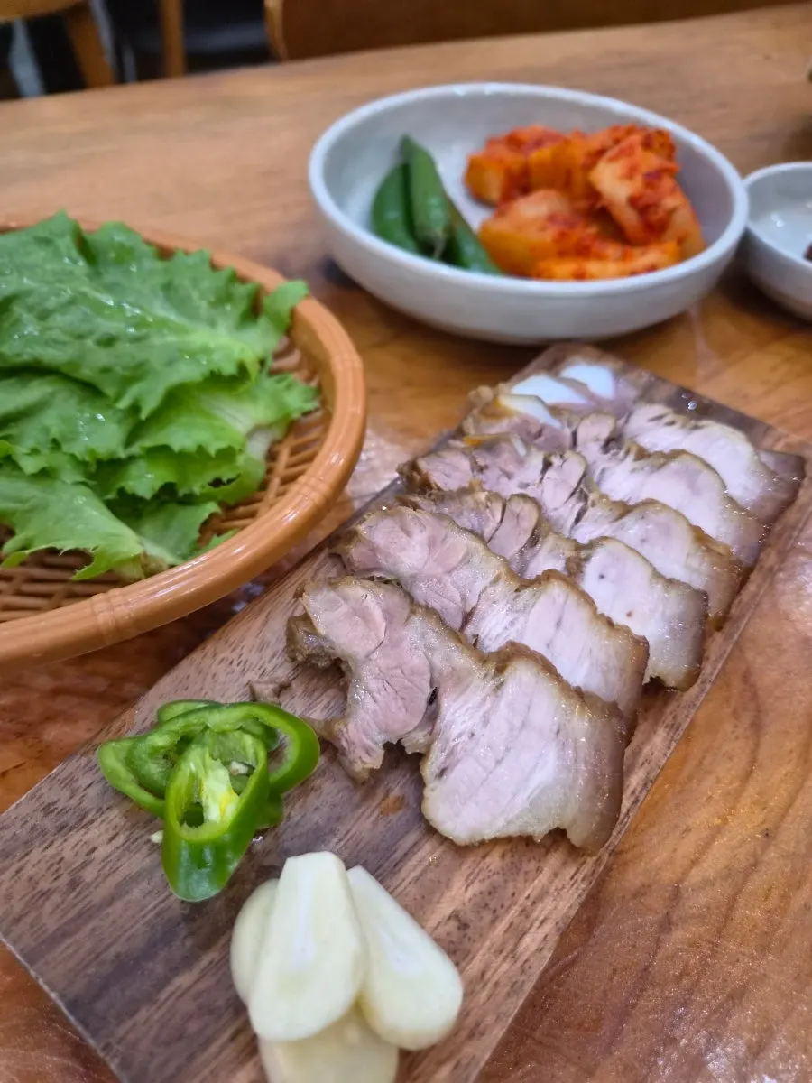 Close-up of a slice of dombe pork