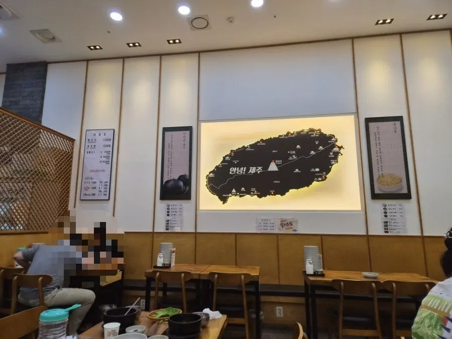Interior with a map of Jeju Island on the wall