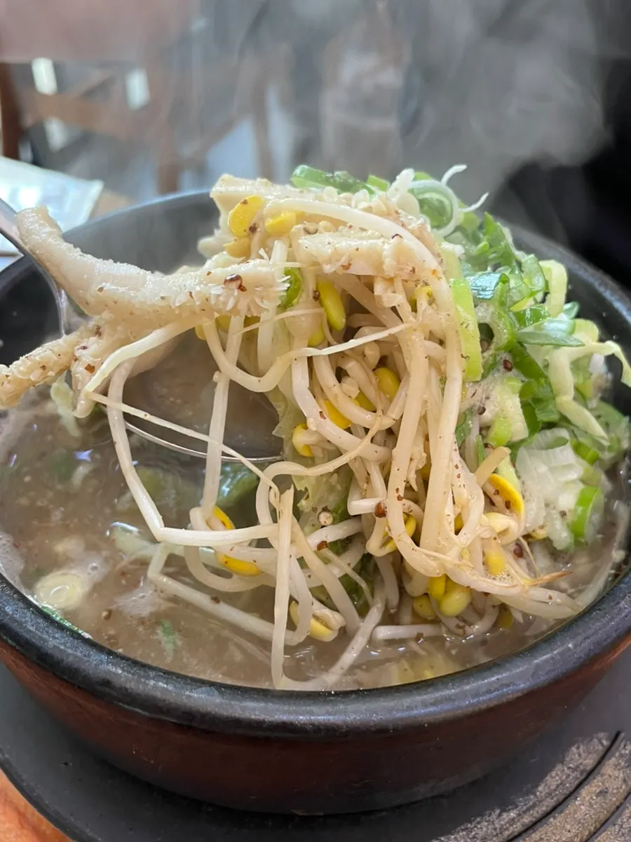 Plate of dombe pork eaten with lettuce wraps