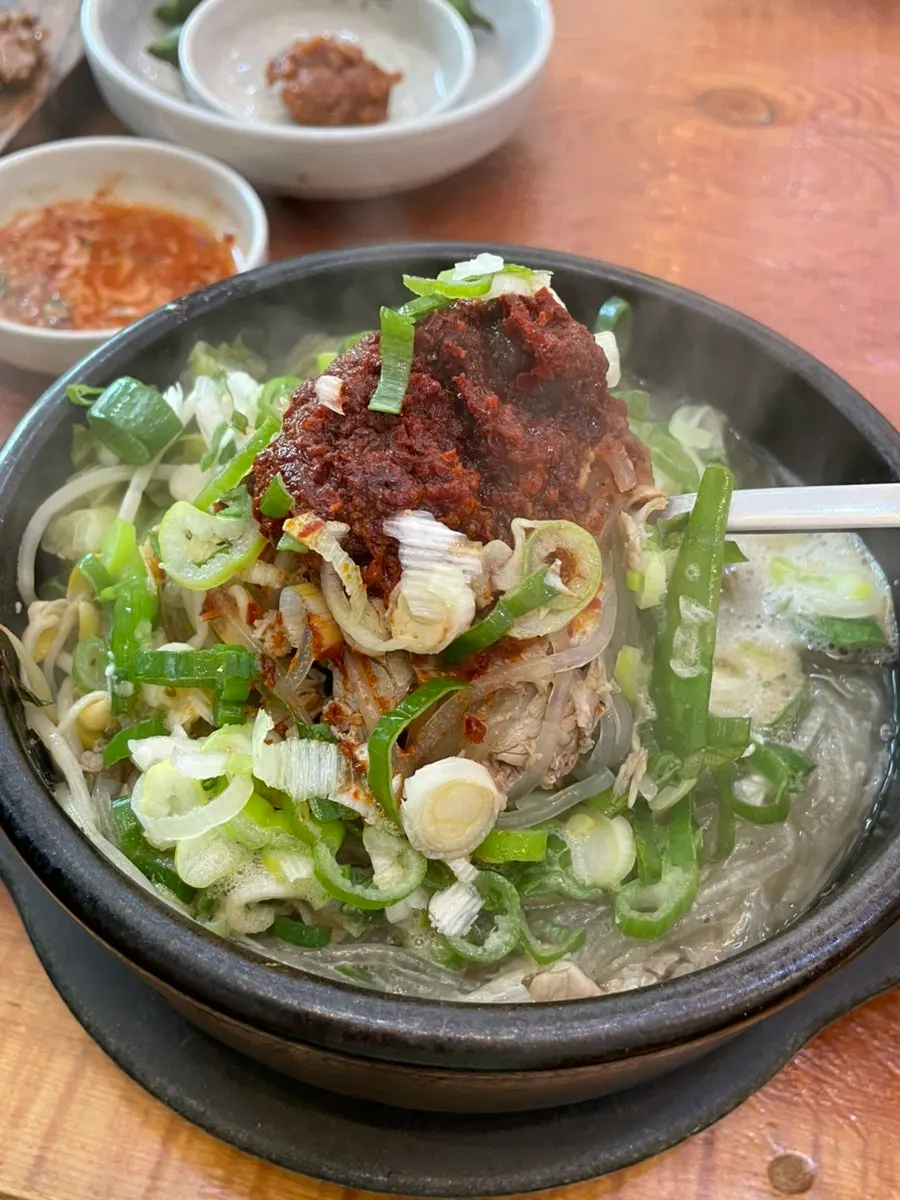 A bowl of tripe soup large enough to fill up an adult man