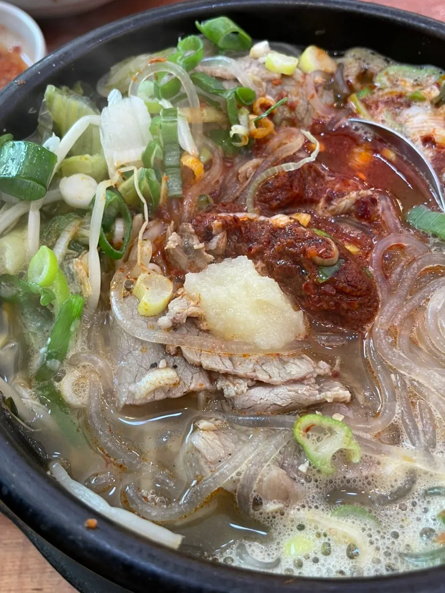 A bowl of haejangguk with rice mixed in