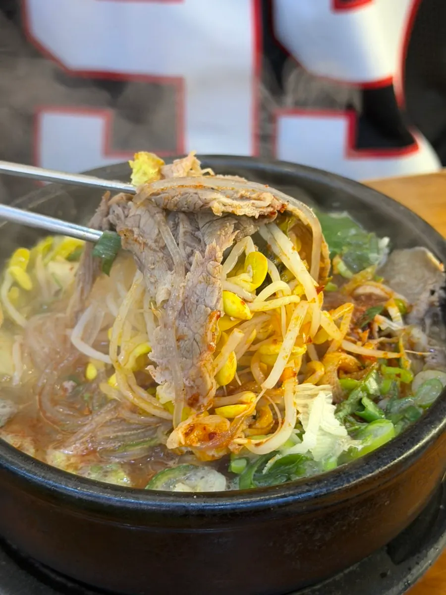 A spoonful of spicy haejangguk broth