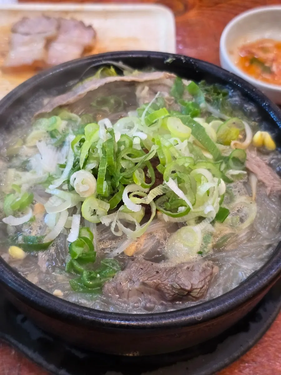 Plate of dombe pork served first