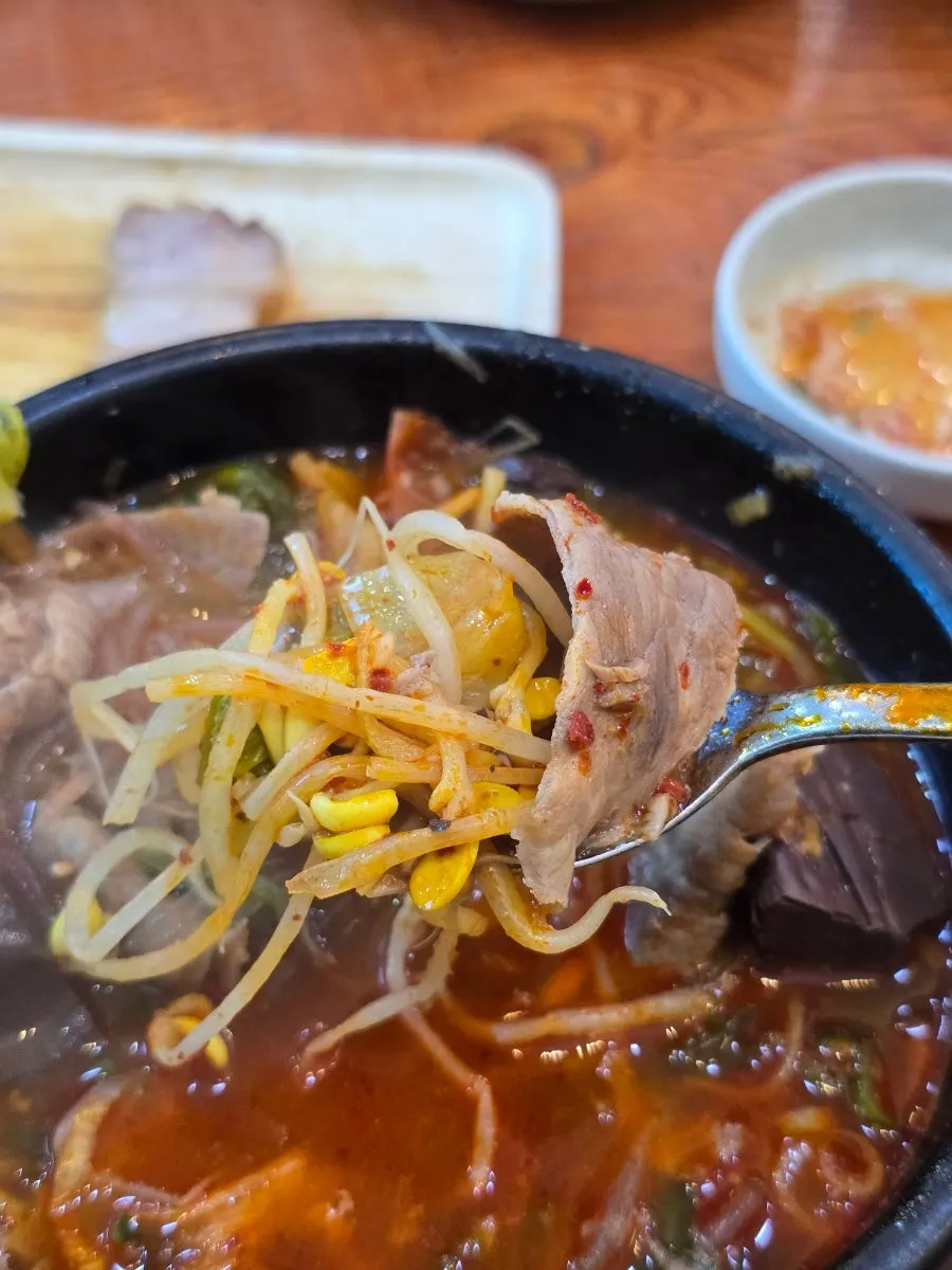 Broth with minced garlic added