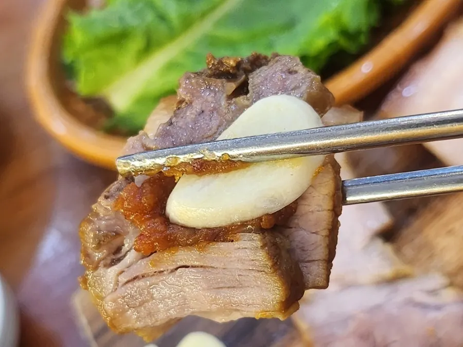 Cross-section of softly sliced dombe pork