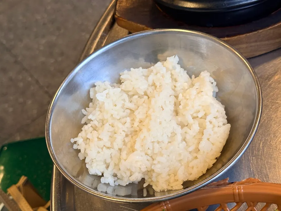 Complimentary grilled pork skin with soybean powder