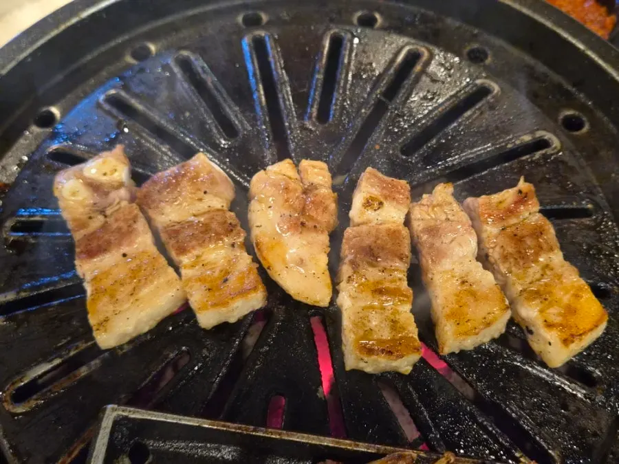 Pork belly grilling on the plate