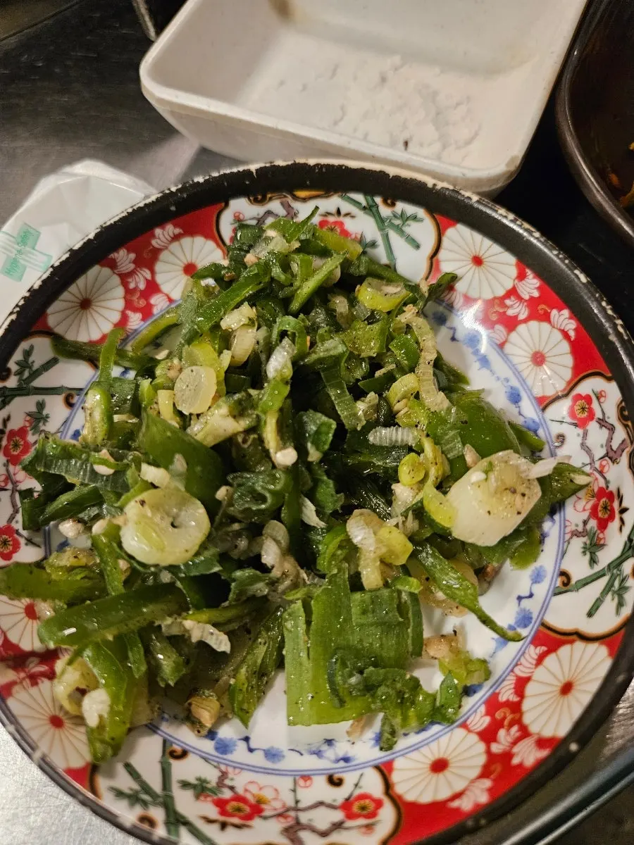 Meat with seasoned garlic scapes