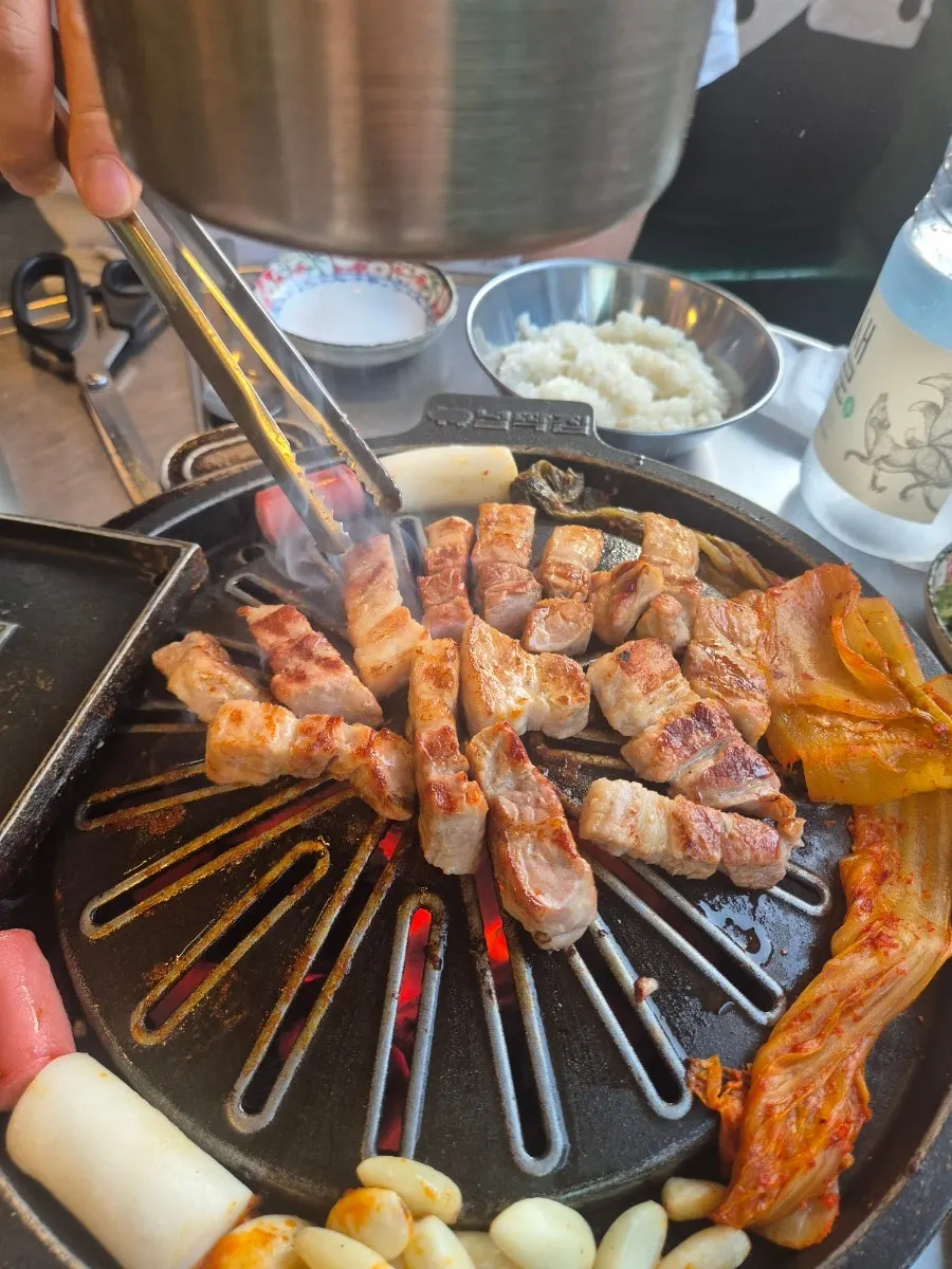 Plate of three servings of raw pork belly at Neopttakjip Samsong Branch